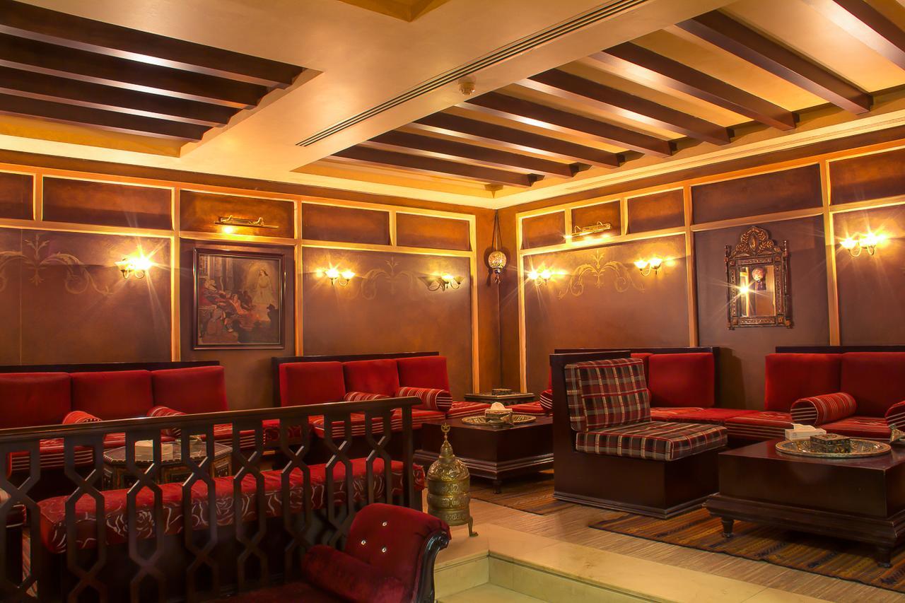 Thousand Nights Hotel Амман Экстерьер фото A coffeehouse in Cairo, Egypt