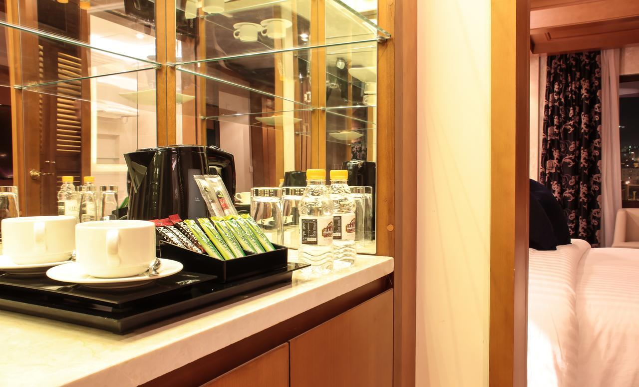 Thousand Nights Hotel Амман Экстерьер фото A Nespresso machine in a hotel room
